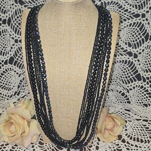 Multi-Strand Black Beaded Necklace with Iridescent Accents
